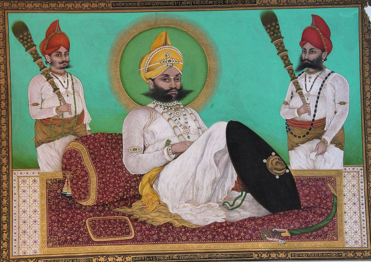 мевар1Portrait_of_Sarup_Singh_with_attendants_(after_William_Carpenter)._Udai851,_C.jpg