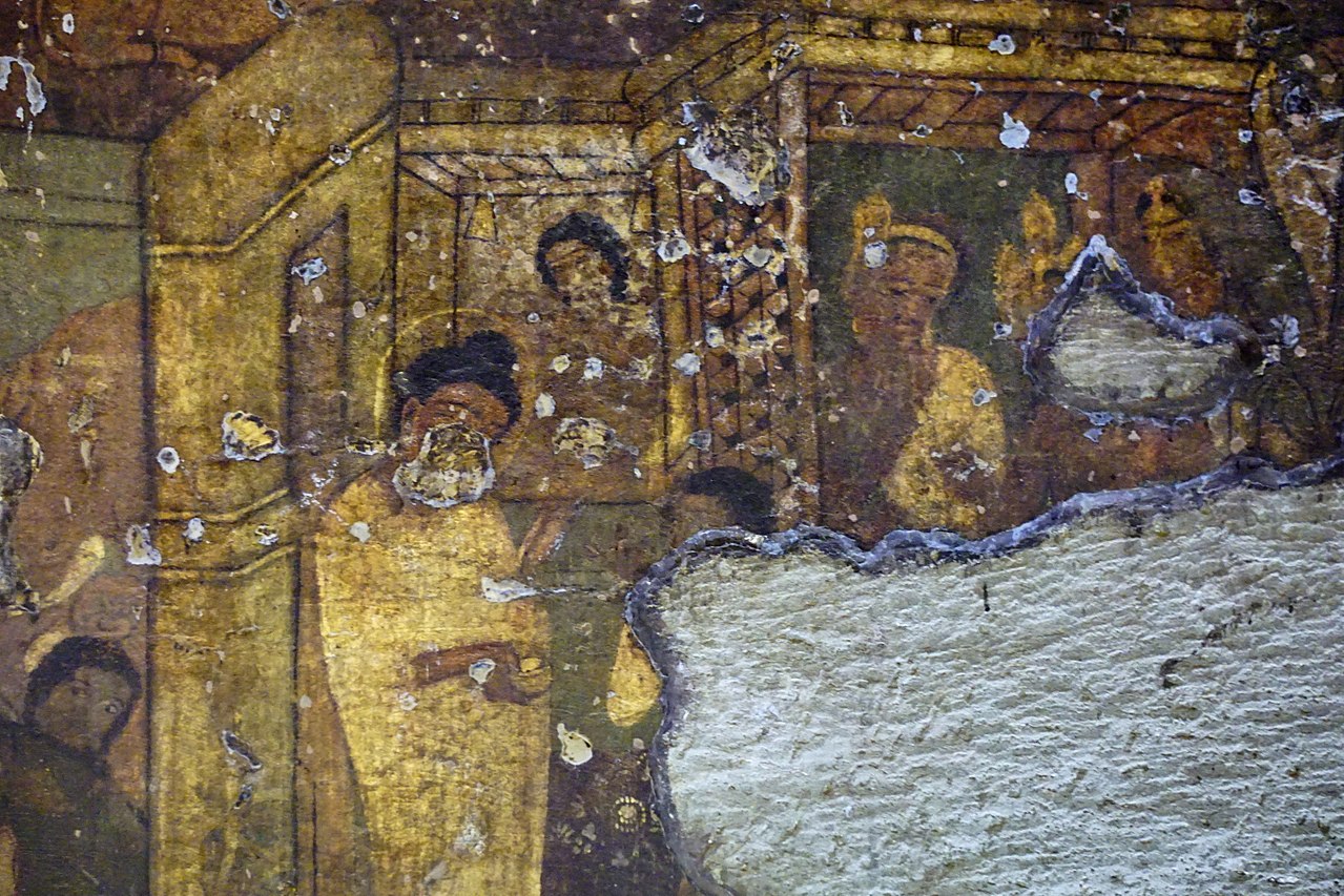 1280px-027_Cave_16,_Buddha_on_Almsround_(33914608490).jpg